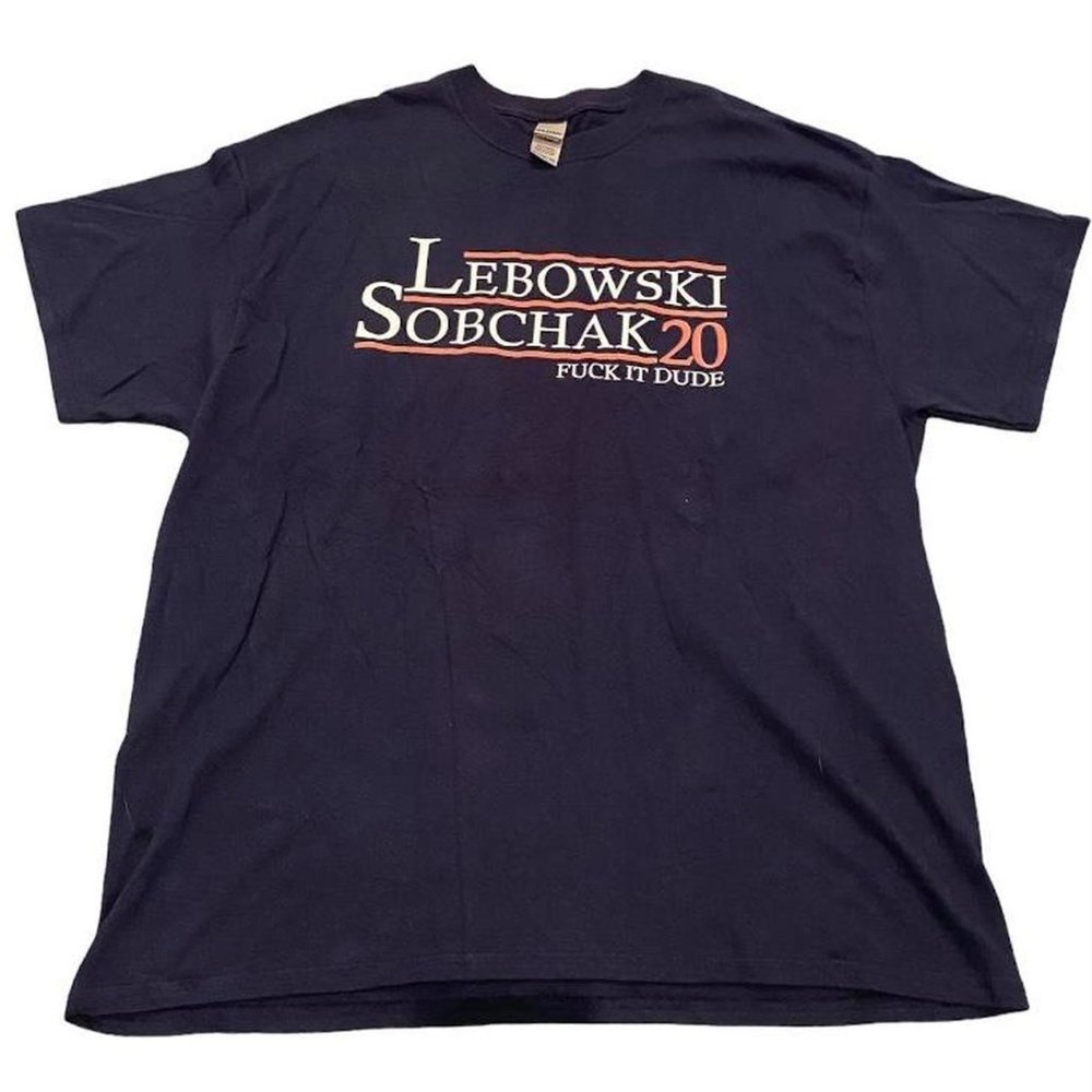 Black Tee with Lebowski and Sobchak ‘20 bid. Their slogan “Fuck it Dude”